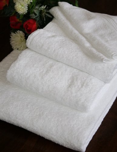 Homescapes Drap de bain eponge (150 x 100cm) de luxe. pur coton peigné ultra doux, 500gm². couleur blanc uni code EAN 0508040011999 