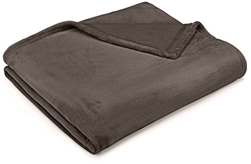 Plaid en peluche effet velours pour le canapé gris