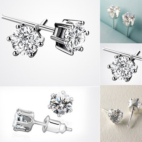 Une paire de clous d'oreilles diamants en six g...