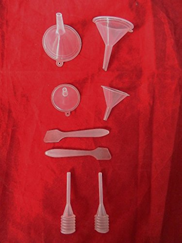 calidad mini entonnoir remplissage flacon parfum : 4 mini entonnoirs + 2 mini spatule + 2 mini pompe code EAN 3964580254154 