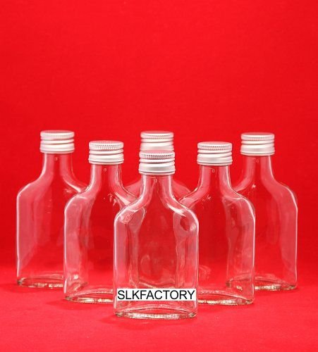 Lot de 20 flacons vides en verre avec fermeture...