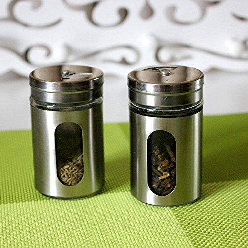 La bouteille en verre de pâte à épices et assai...