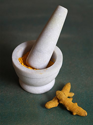 Mortier et pilon traditionnel en pierre de savo...